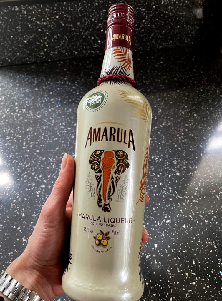 Holding Amarula Vegan Cream Liqueur